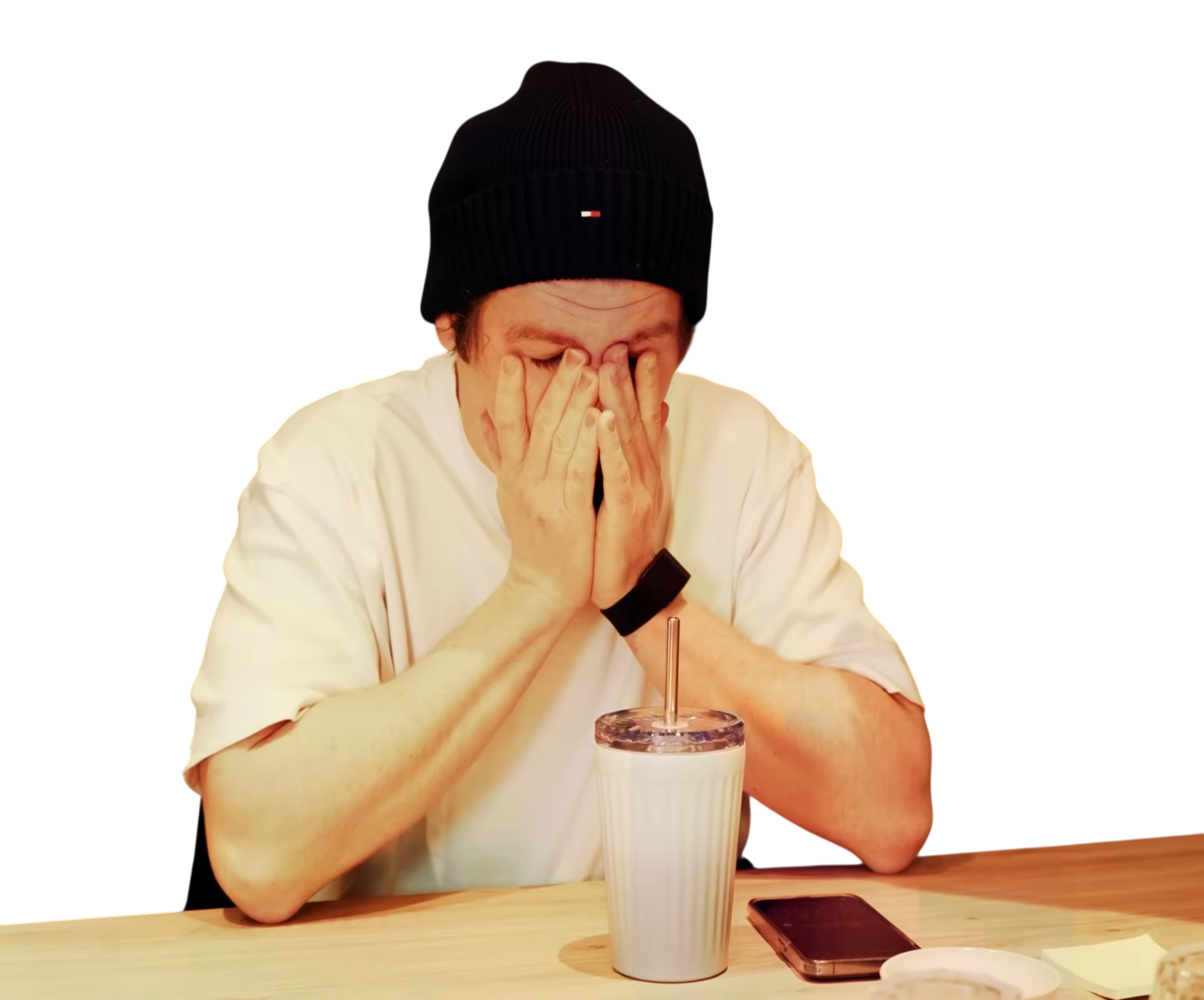Kai Lentit covering his face with both hands
