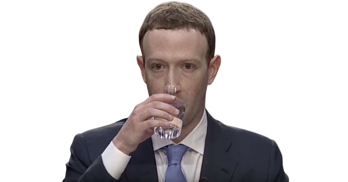 Mark Zuckerberg drinking water at the Senate hearing